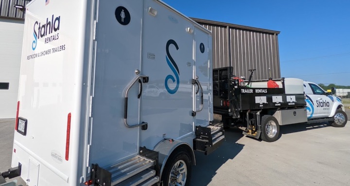 Stahla Rentals portable restroom trailers and pickup truck.