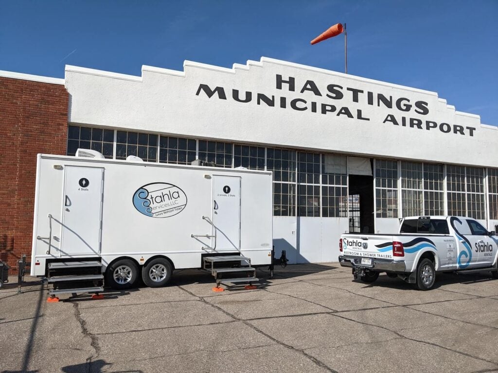 Hastings Airport building with Stahla Services trucks.