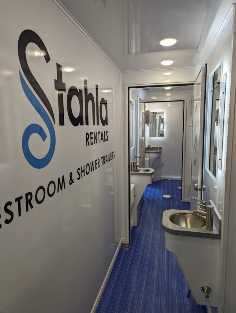 Interior of modern mobile restroom and shower trailer.
