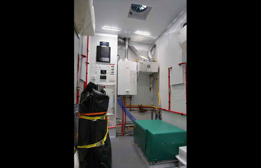 Industrial control room with electrical equipment.