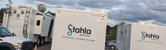 Stahla Rentals restroom and shower trailer fleet outdoors.