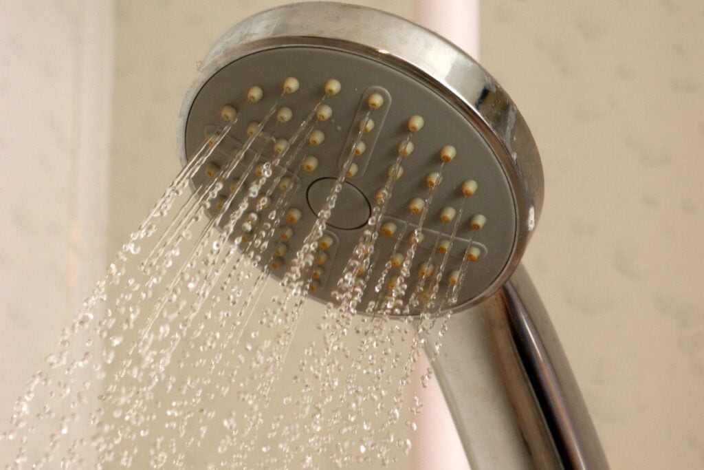 Running water from shower head.