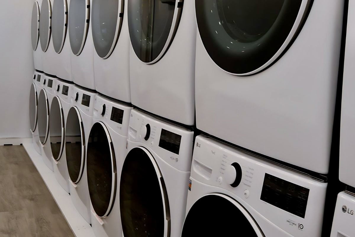 Commercial laundry trailer interior with washers and dryers